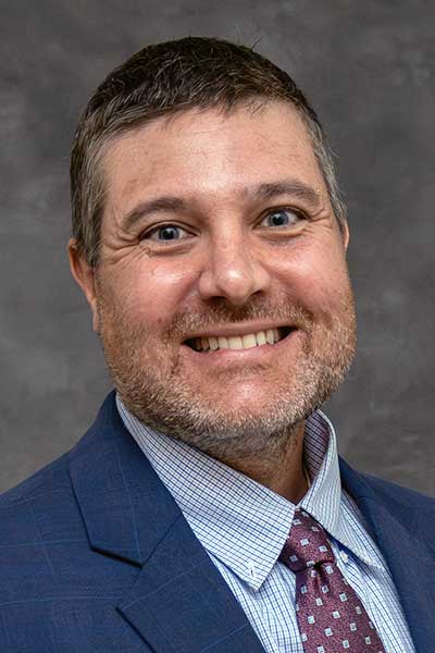 John Apolzan, PhD, FTOS